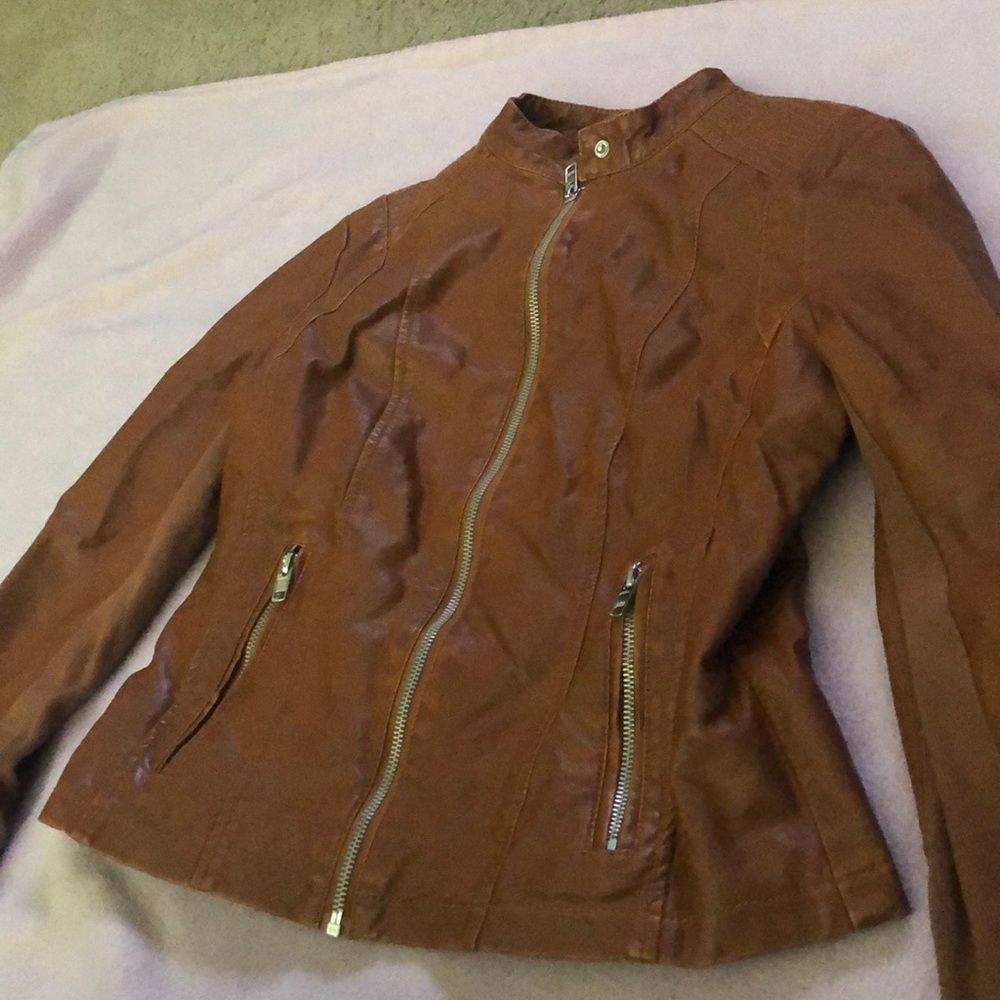 Leather jacket cinched in
